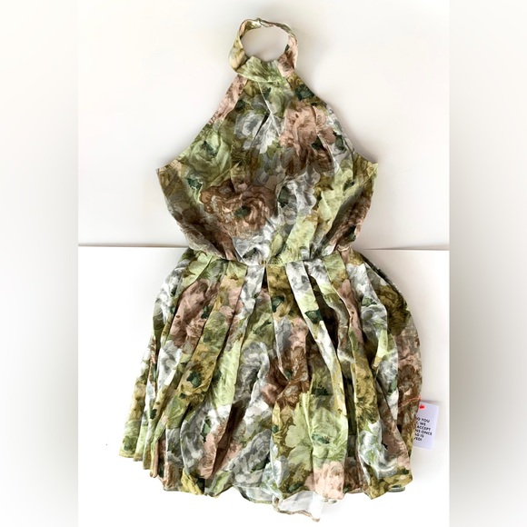 ASOS DESIGN Halter mini dress with bow back in floral print - Picture 3 of 14